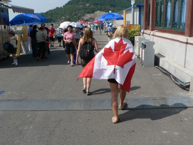 Now we were in, but we wanted to meet up with the rest of the Canadians in a different section than we had tickets for.  We thought the huge Canadian flag would get us in with question, and we were right.