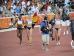 Even with the blurry picture, you can still see the ripped six-packs of the Belgian 4x100 silver medalists.  :-)