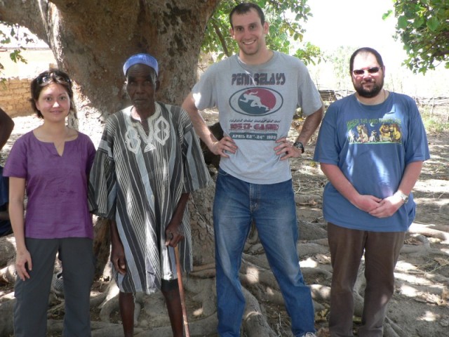 Elizabeth took us to meet the chief of the village.  He was very kind to us and said that we could stay as long as we wanted.  He even put on his special cloak and posed with us for a picture.