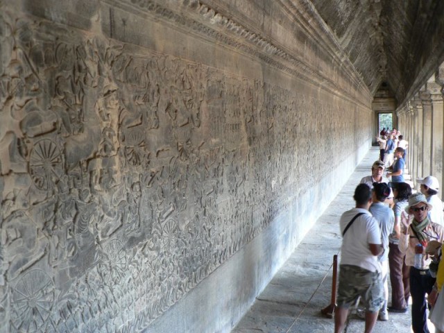 The reliefs stretched on and on, telling a story of a battle.