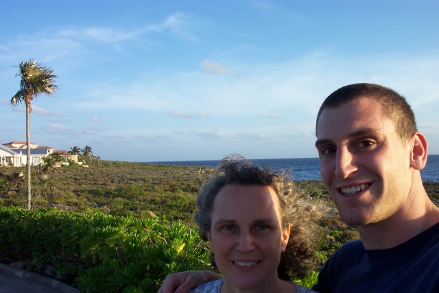 Mom and I pose by the beach