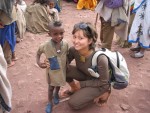 Sara made another friend!  We saw many rural children with this hairstyle.  We were told that it was in case God wanted to snatch the child into heaven, he would have something to hold onto.  :-)