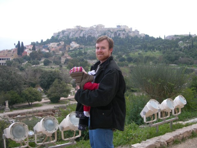 Mike and Maya are chillin' with the Acropolis living large on the hilltop behind them.