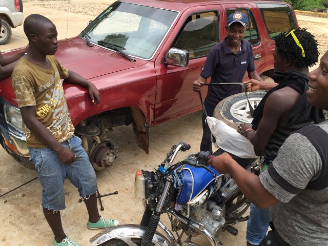 We had a flat tire coming up. While I was touring these guys had driven to the town to get the tire repaired. They weren't back by the time that I finished, but 20 minutes later they were back in action and all smiles.