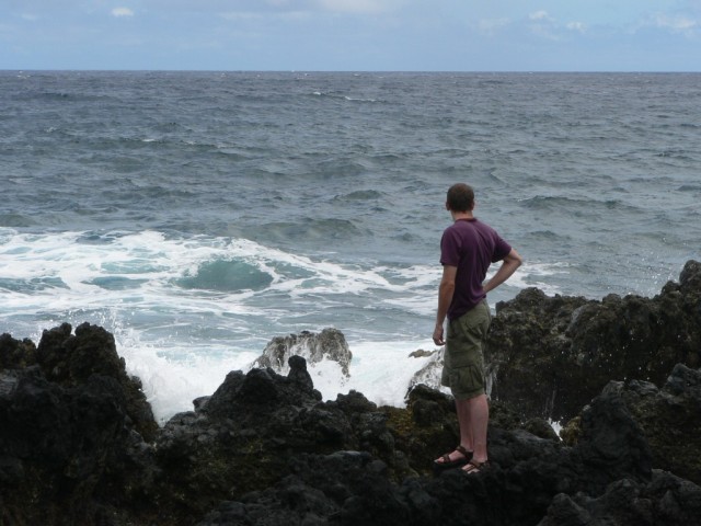 The road winds between lush rain forest and beautiful beaches. We stopped here to play on the rocks.