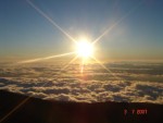 Haleakala is 10,023 feet above sea level, and it was cold at the top! We huddled here to watch the sunset.