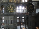 This is the interior of the Haghia Sophia.  Eight calligraphic discs were added to the church when it was converted to a mosque.