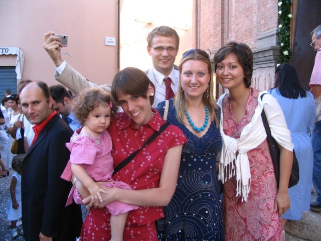 The Exeter friends wait for the bride and groom to emerge..