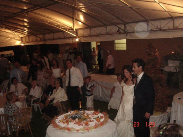 The cutting of the cake.