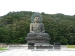As we hike the path through this beautiful valley we come upon a giant Buddha.