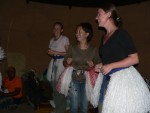 The highlight of the cultural tour for me was a song and dance performance by a group of Basotho women.  They also demanded that our girls put on the same skirts and dance with them.  Everyone was enjoying themselves.  :-)