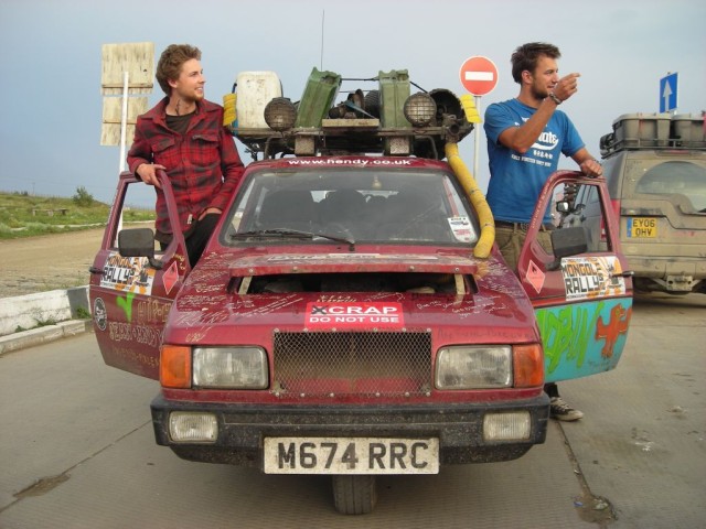 They had completed the rally and were on their way back home. Mongolia wouldn't accept the car as a donation so they were going to try to ditch the car in Russia and fly home.  They said that nearly every piece of the engine broke during the trip, and they spent hours each and every day repairing their car. They broke the rear axle in the middle of Siberia and had to sit for 4 days while a new axle was shipped from England.