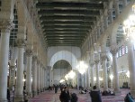 The inside of the Umayyad Mosque.  All women were required to wear a headscarf, regardless of their religion.