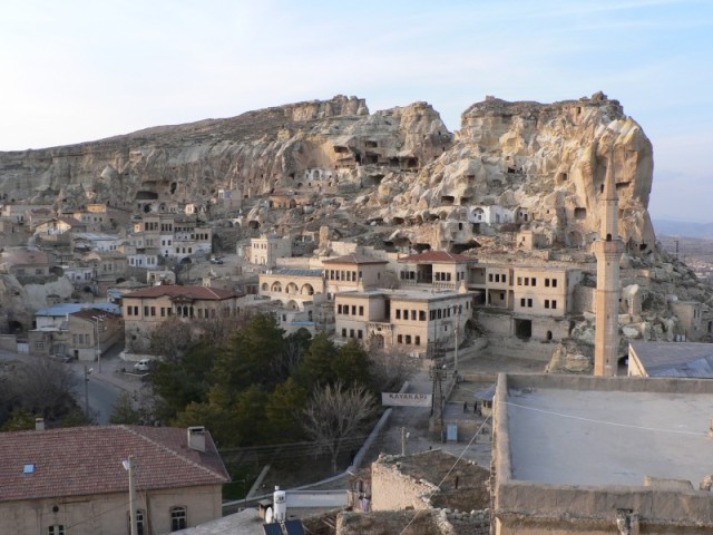 Downtown Urgup.  Notice the caves in the cliffs behind the town.  Up until the last 100 years this is where much of the population lived.