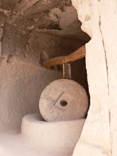 An ancient wheel to grind grain.