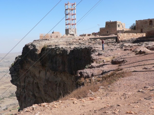 Nowadays they bring the power straight up over the cliffs.  I'm glad I wasn't working on the project to hang those wires..