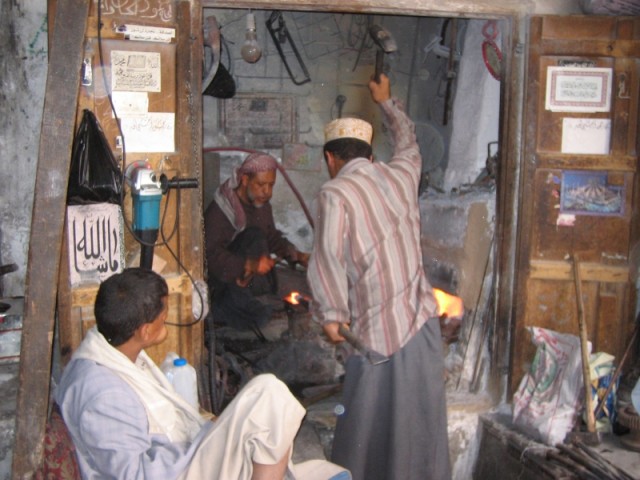Sana'a has claims on being the oldest continuously inhabited city in the world.  Life here in the old city is much the same as it has been for hundreds of years.  Here a jambiya blade is fashioned by a blacksmith.