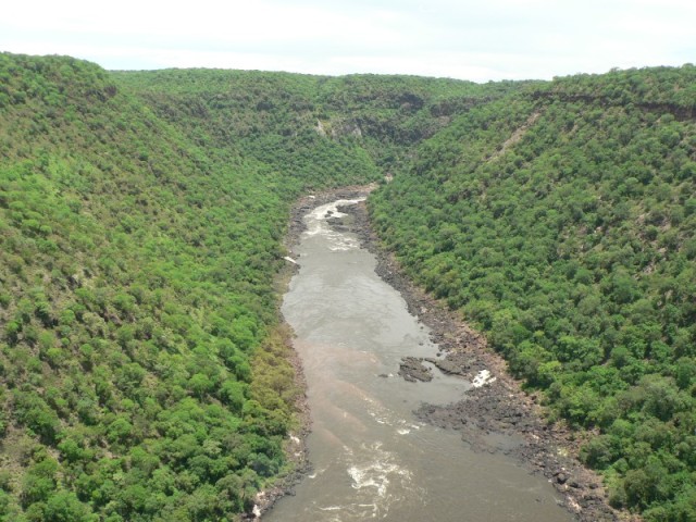 This is the Zambezi river a bit south of the falls.  Riding in a helicopter was so much fun for me!  I decided while in the air that I must have one!  ;-)