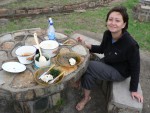 It was one of the best meals that we had on the trip!  She had ground up corn meal to make a delicious rice-like starchy dish that we poured stewed pumpkin leaves and some meat over. It was amazing, my mouth is watering just thinking of it.  :-)